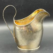 A hallmarked silver milk or cream jug, Birmingham 1929 by Eldona Manufacturing Co Ltd, approximate