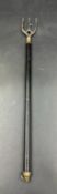 An extendable antique, brass and ebonised toasting fork