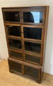 An English oak sectional bookcase, two parts (H164cm W89cm D30cm)