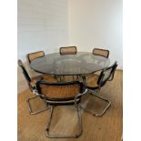 A 1970's Richard Young for Merrow Associates chrome and glass topped circular dining table along