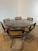 A 1970's Richard Young for Merrow Associates chrome and glass topped circular dining table along