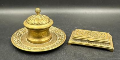 A 19th Century brass inkwell with glass insert and a brass trinket box on feet