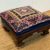 A needle work topped footstool on bracket feet (H28cm Sq45cm)
