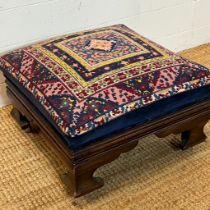 A needle work topped footstool on bracket feet (H28cm Sq45cm)