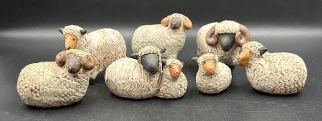 A selection of seven studio pottery sheep figures including four from Cornwall based pottery