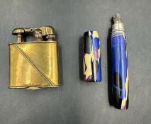 A pre war Dainty lighter in pen form and an unmarked brass lighter