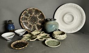 A selection of mixed ceramics to include lidded jars, dishes and serving plates