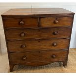 A mahogany chest of drawers two over three with bun handles AF
