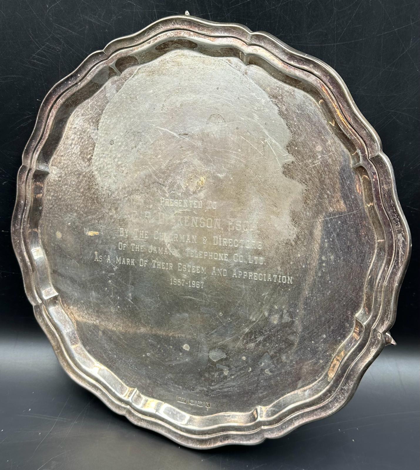 A silver tray, engraved, hallmarked for Sheffield 1965 by Viner's Ltd on three feet. Approximate