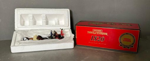 A Matchbox models of Yesteryear passenger coach and horses, boxed