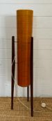 A Mid Century floor standing teak rocket lamp with orange spur fibre glass shade )H113cm)