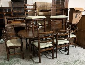 An oak extendable dining table and eight chairs to include two carvers (H73cm W180cm D104cm)