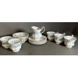 A part Richmond blue rock tea service to include side plates, cups and saucers and a milk jug