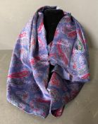 A vintage Sulka and Company of Old Bond street silk scarf in a purple and pink paisley pattern