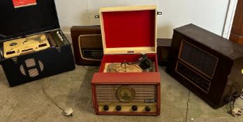 A selection of vintage radios and record players to include a Monarch three speed, a Collardo tape