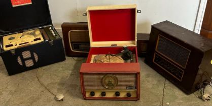 A selection of vintage radios and record players to include a Monarch three speed, a Collardo tape