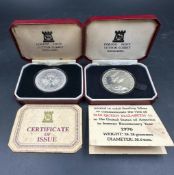 Two Pobjoy mint silver coins, boxed HM Queen Elizabeth II 1976 visit to USA and 1977 Queens Silver