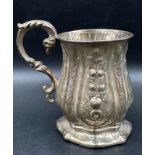 A Victorian ornate silver tankard, approximate 8.5cm high, Birmingham 1868, approximate total weight