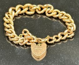 A 9ct gold bracelet with a heart shaped fastener, approximate total weight 14.4g