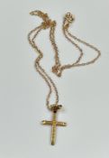 A 9ct gold cross on a fine necklace with an approximate total weight of 2g.