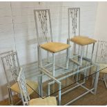 A large glass and metal framed table with six high back chairs (H74cm W180cm D90cm)