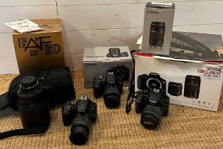 A collection of digital SLR cameras and lens, Canon and Nikon
