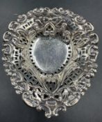 A silver heart shaped pin dish, hallmarked for Birmingham by Matthew John Jessop 1897.