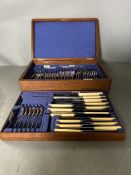 A boxed six setting canteen of cutlery