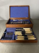 A boxed six setting canteen of cutlery