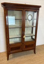 A Mahogany inlaid display cabinet, inlaid and crossbanded in satinwood. English C1890 Three