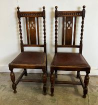 Two oak side chairs with barley twist sides