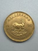 A 1974 gold Krugerrand coin