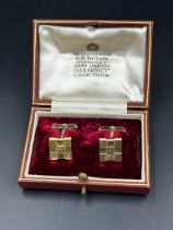 A pair of 18ct gold vintage Garrard & Co cuff links, with an approximate total weight of 10g.