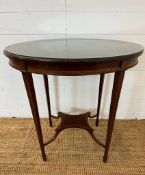 An oval mahogany inlaid occasional table with central stretcher (H80cm W67cm D46cm)