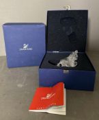 A boxed Swarovski crystal lion