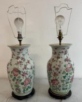 A pair of Chinese ceramic vase table lamps with floral decoration