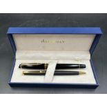 A boxed Waterman fountain pen and biro