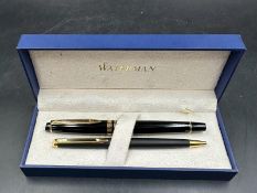 A boxed Waterman fountain pen and biro