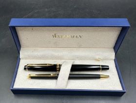 A boxed Waterman fountain pen and biro