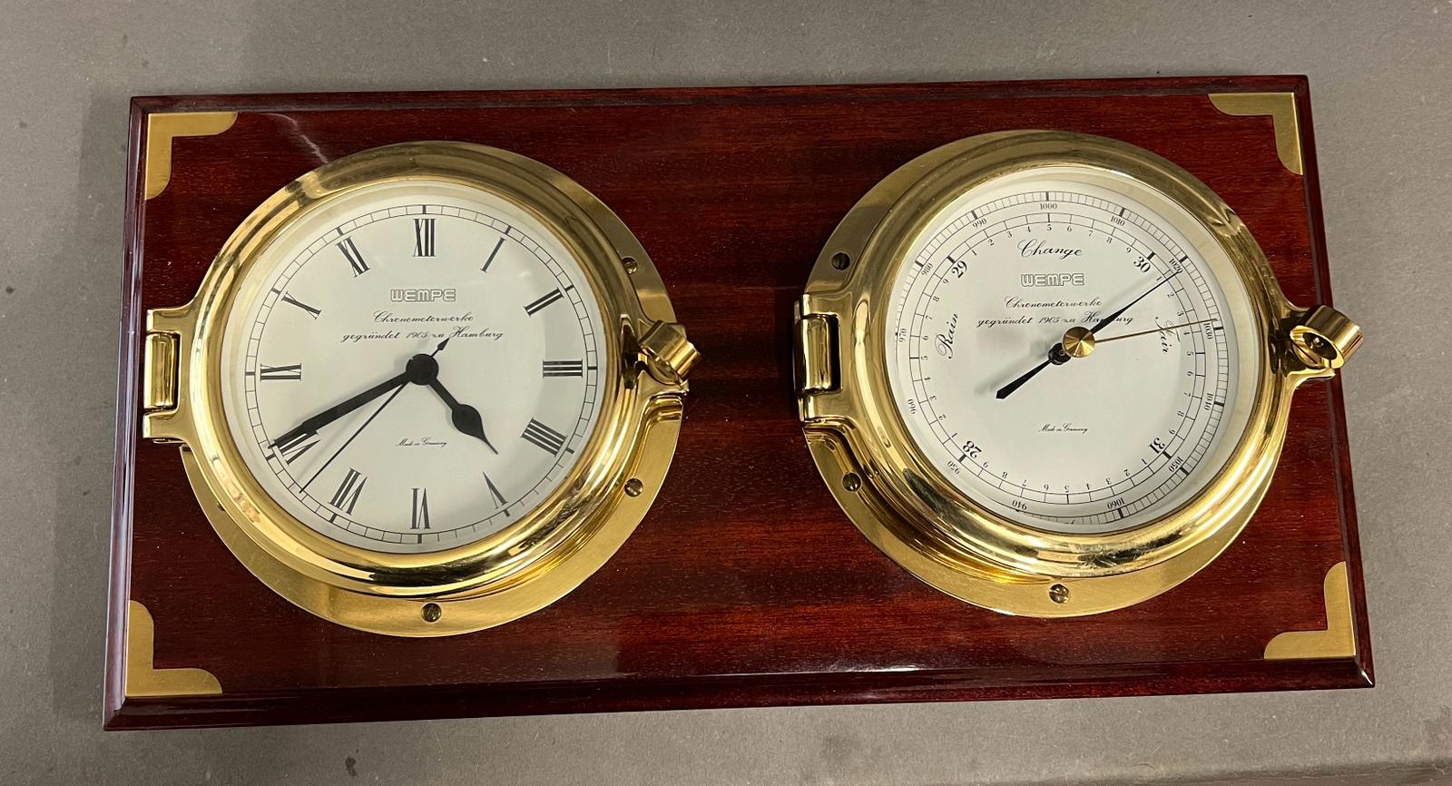 A clock and a barometer set (18cm x 36cm)