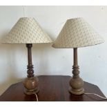 A pair of wooden turned table lamps