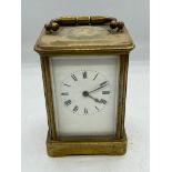 A brass carriage clock