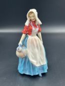 A Royal Doulton Jersey Milkmaid figurine, approximately 17cm H