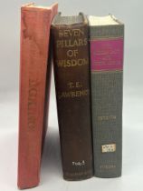 Three hard back books, Seven Pillars of Wisdom, The Middle East and North Africa 1973 - 74 and