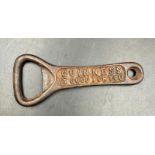 A vintage "Guinness Is Good For You" bottle opener