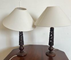Two turned and carved hardwood table lamps (One AF)