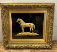 A gilt cast metal relief figure of a horse