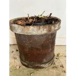 An oval copper weathered planter (H41cm W40cm)