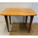 A Mid Century collapsible side table on splayed legs (H50cm W70cm D47cm)