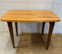 A Mid Century collapsible side table on splayed legs (H50cm W70cm D47cm)